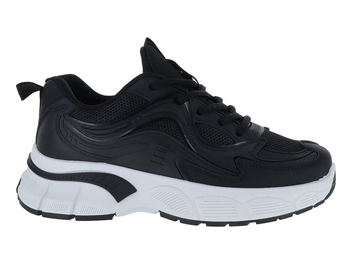 Tenis deportivos ATOK en color negro con suela blanca gruesa y detalles sintéticos.