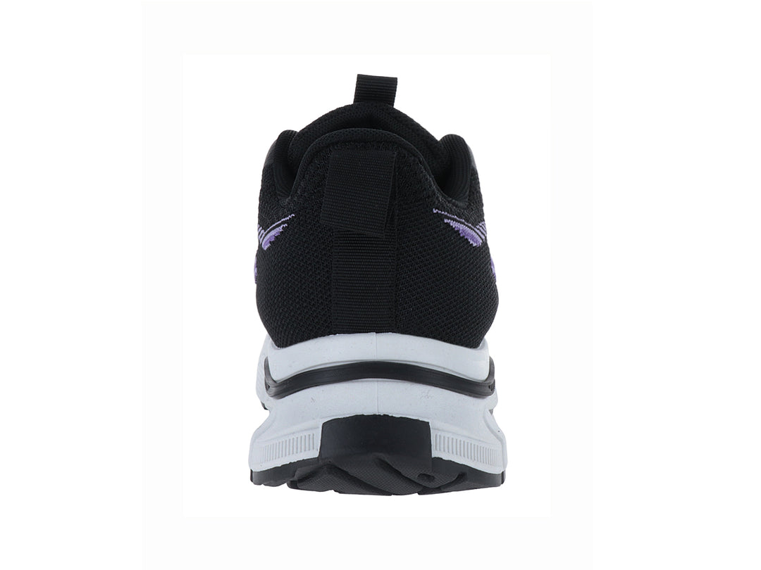 Tenis deportivos ATOK color negro con detalles en morado y suela blanca gruesa.