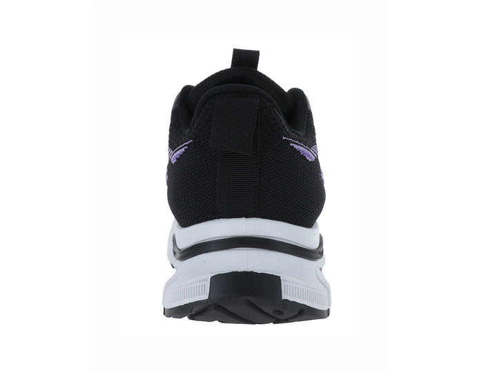 Tenis deportivos ATOK color negro con detalles en morado y suela blanca gruesa.