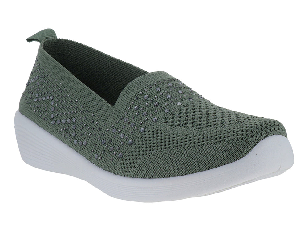 Zapato deportivo slip-on color verde con detalles brillantes y suela blanca.