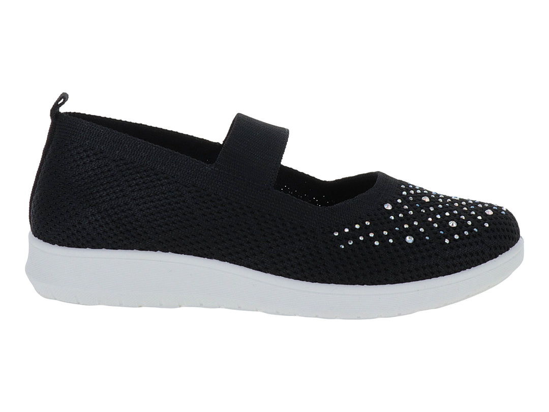 Zapato deportivo infantil negro de tela con detalles brillantes en la punta y suela blanca.