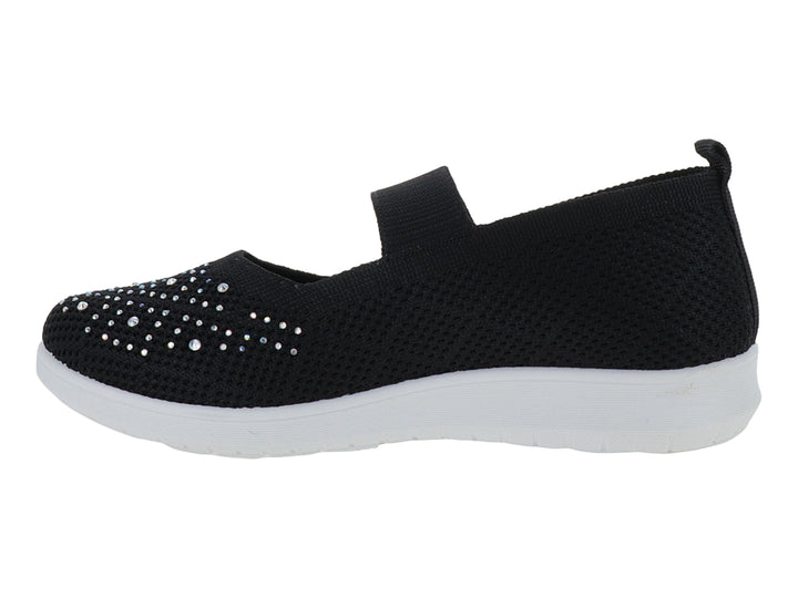 Zapato deportivo infantil negro de tela con detalles brillantes en la punta y suela blanca.