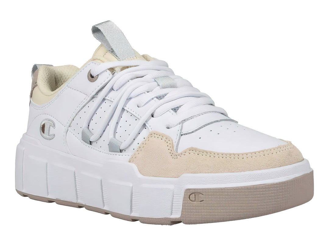 Tenis Champion color blanco con detalles en beige y suela de plataforma blanca.
