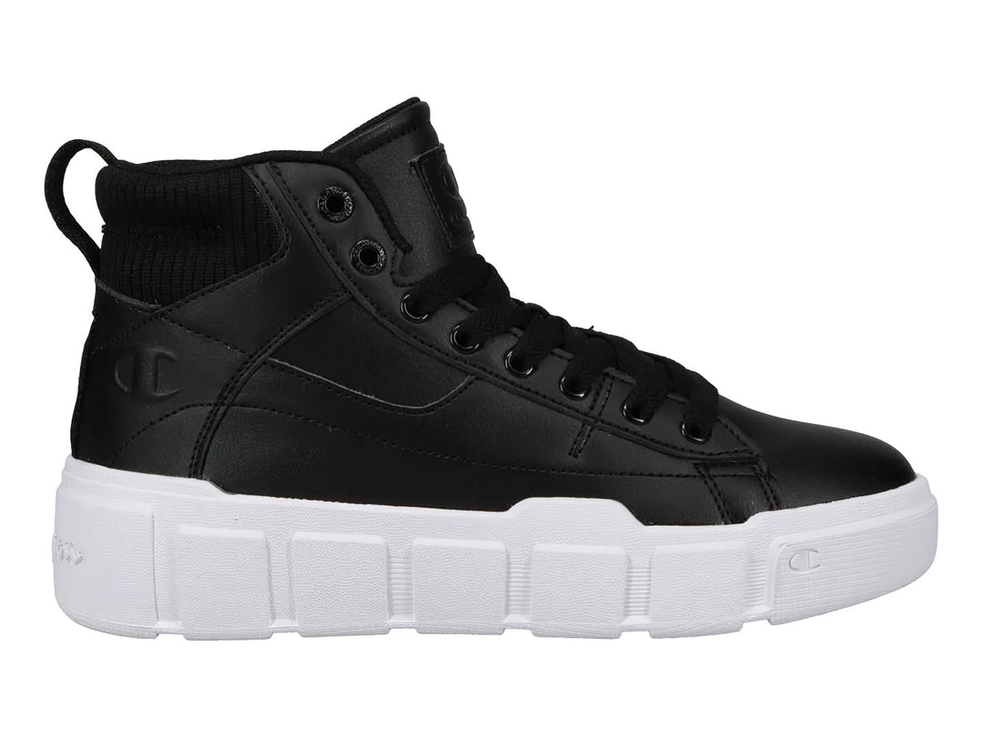 Tenis Champion de bota color negro con suela blanca ancha y plataforma.