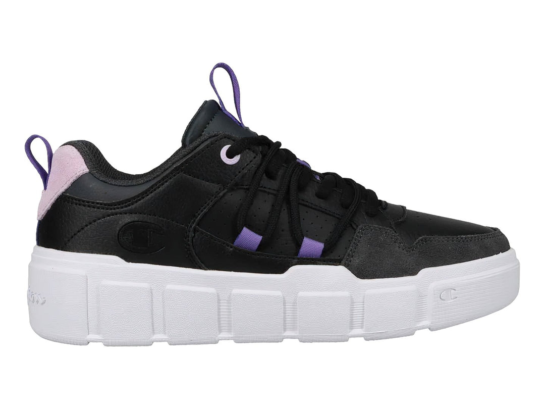 Tenis Champion negros con suela blanca de plataforma y detalles en color lavanda.