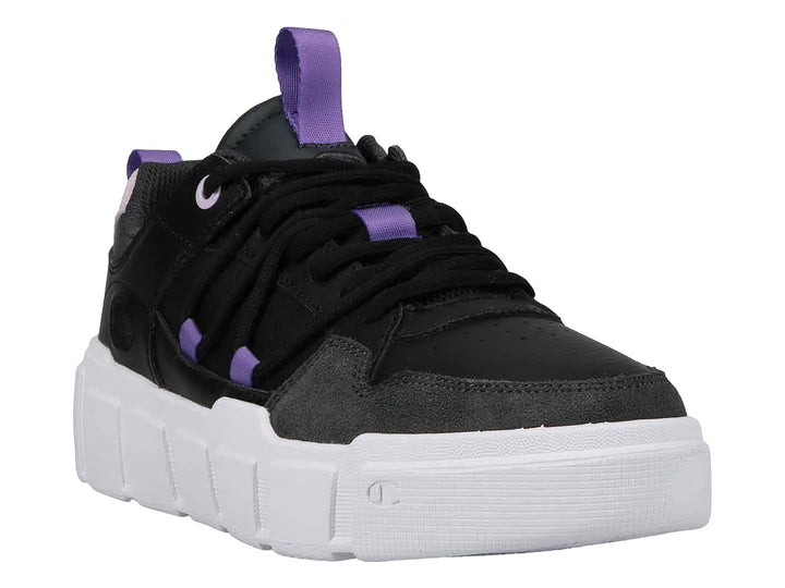 Tenis Champion negros con suela blanca de plataforma y detalles en color lavanda.