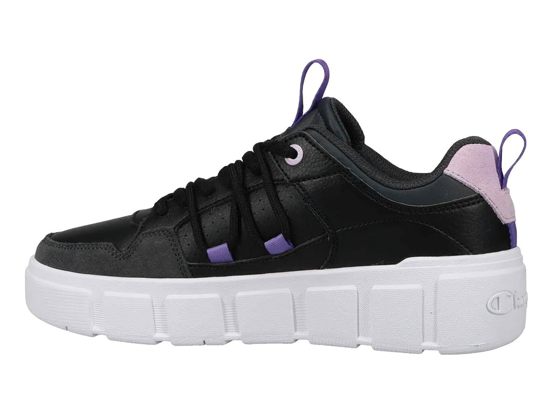 Tenis Champion negros con suela blanca de plataforma y detalles en color lavanda.