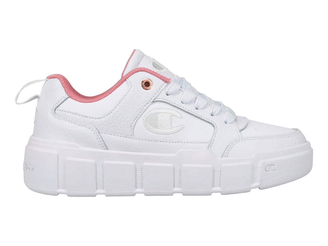 Tenis blancos de plataforma marca Champion con detalles en rosa en el cuello y suela ancha.