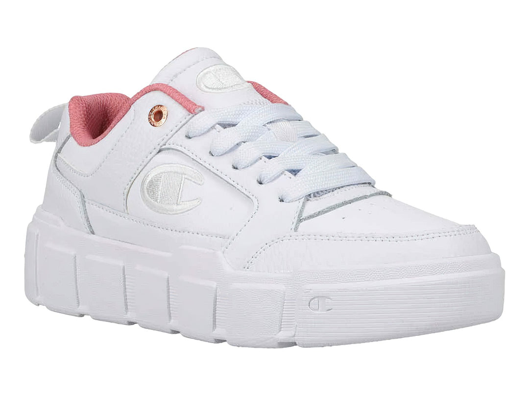 Tenis blancos de plataforma marca Champion con detalles en rosa en el cuello y suela ancha.