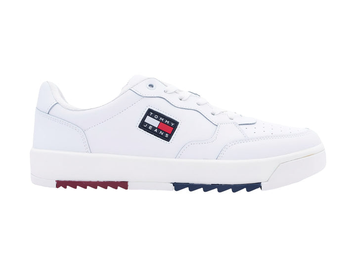 Tenis blancos Tommy Jeans de corte bajo con detalles en rojo y azul en la suela.