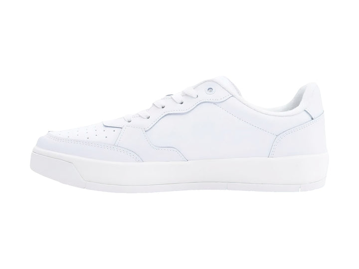 Tenis blancos Tommy Jeans de corte bajo con detalles en rojo y azul en la suela.
