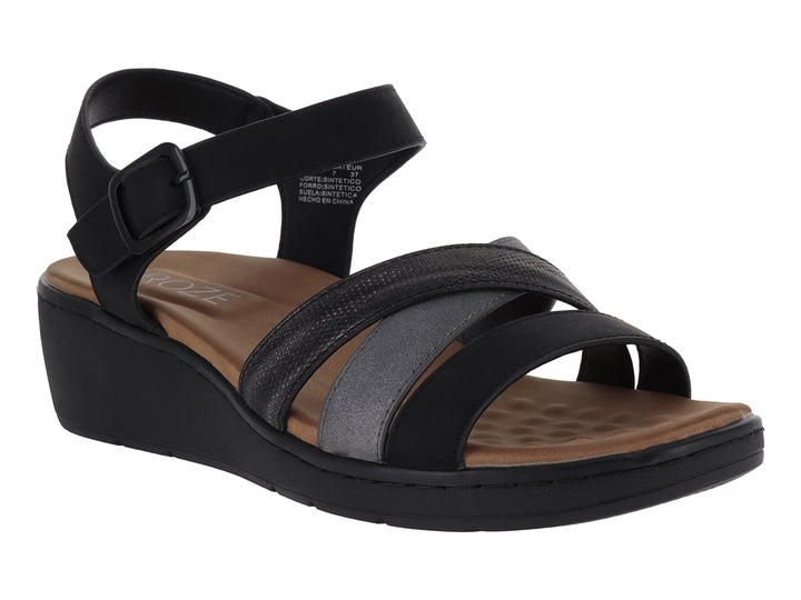 Sandalia de plataforma color negro con tiras cruzadas y correa al tobillo con hebilla.