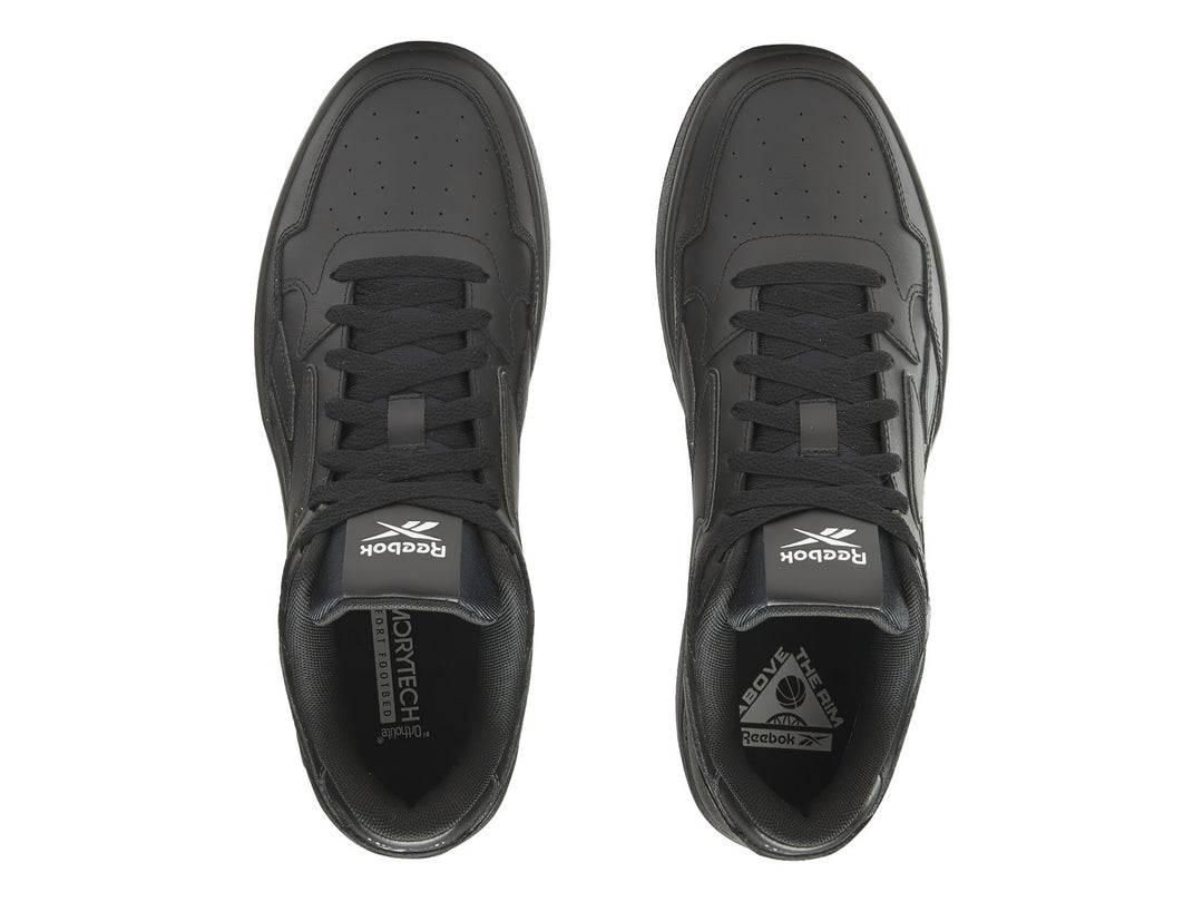 Tenis deportivos Reebok color negro total con suela ancha y diseño clásico.