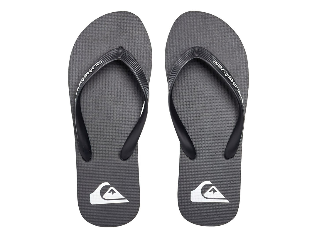 Sandalias Quiksilver color negro con detalles en blanco y logotipo en la correa y planta.