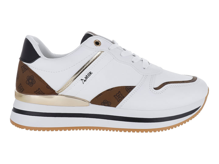 Tenis casuales ATOK color blanco con detalles en café, negro y dorado, con suela de goma color miel.