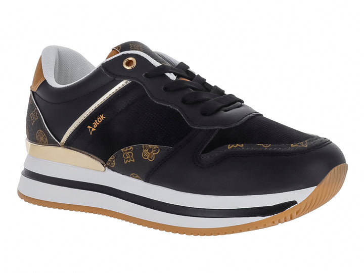 Tenis ATOK color negro con detalles dorados y suela blanca y café.
