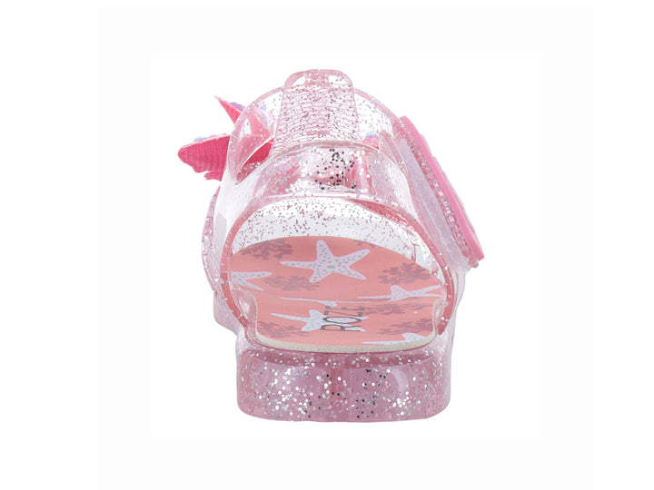 Sandalias infantiles color rosa con glitter, material transparente y un moño decorativo en la parte superior.