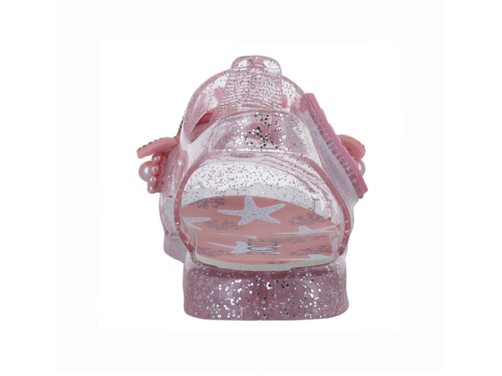 Sandalias infantiles color rosa con glitter, detalle de moño con perlas y correa ajustable marca ROZE.