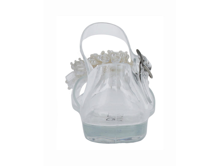 Sandalia transparente para niña con detalle de perlas blancas en la punta y correa con hebilla.