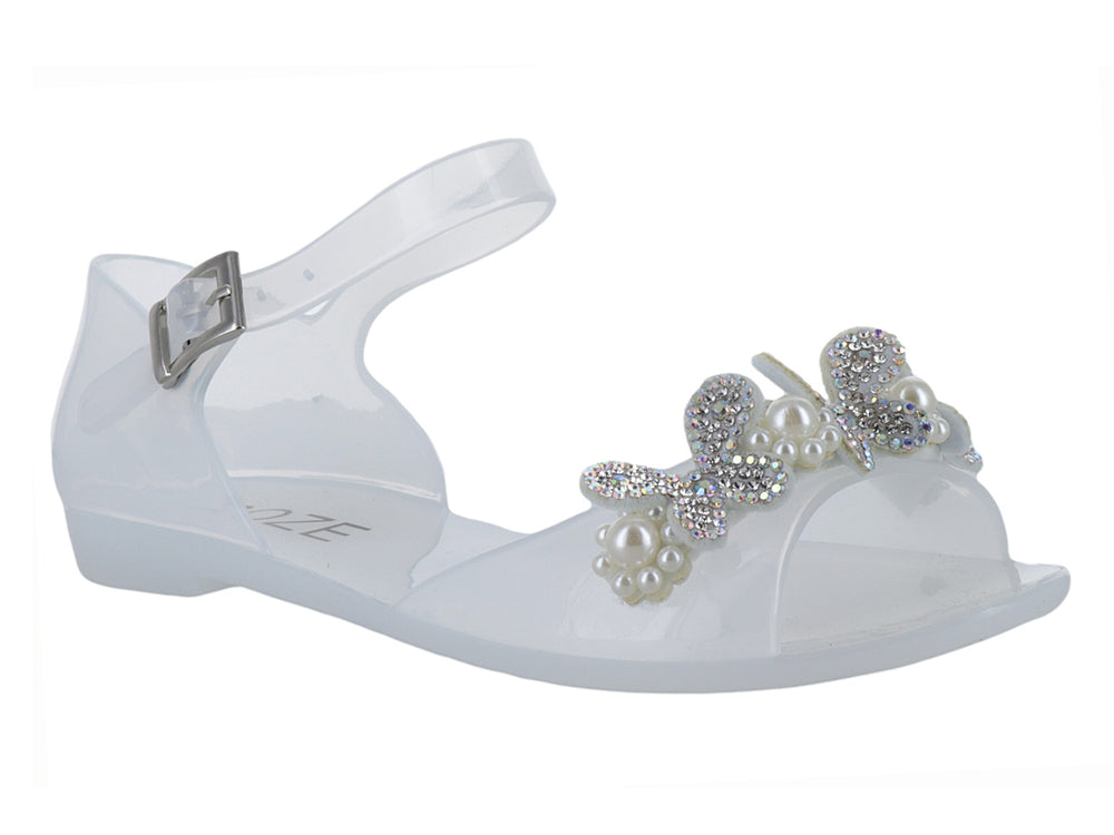 Sandalia blanca para niña con detalle de moño y perlas, correa ajustable y acabado brillante.