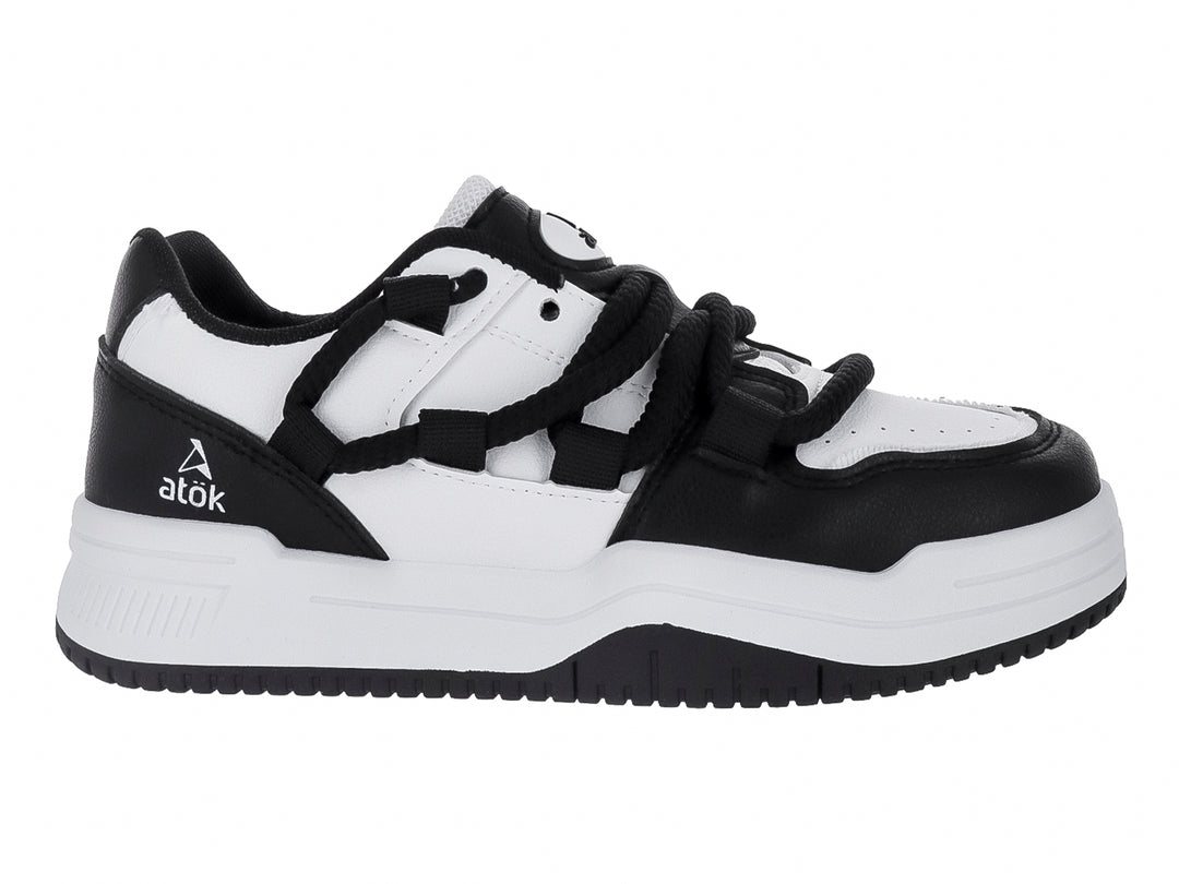 Tenis deportivos ATOK en colores blanco y negro con suela de plataforma y cordones anchos.