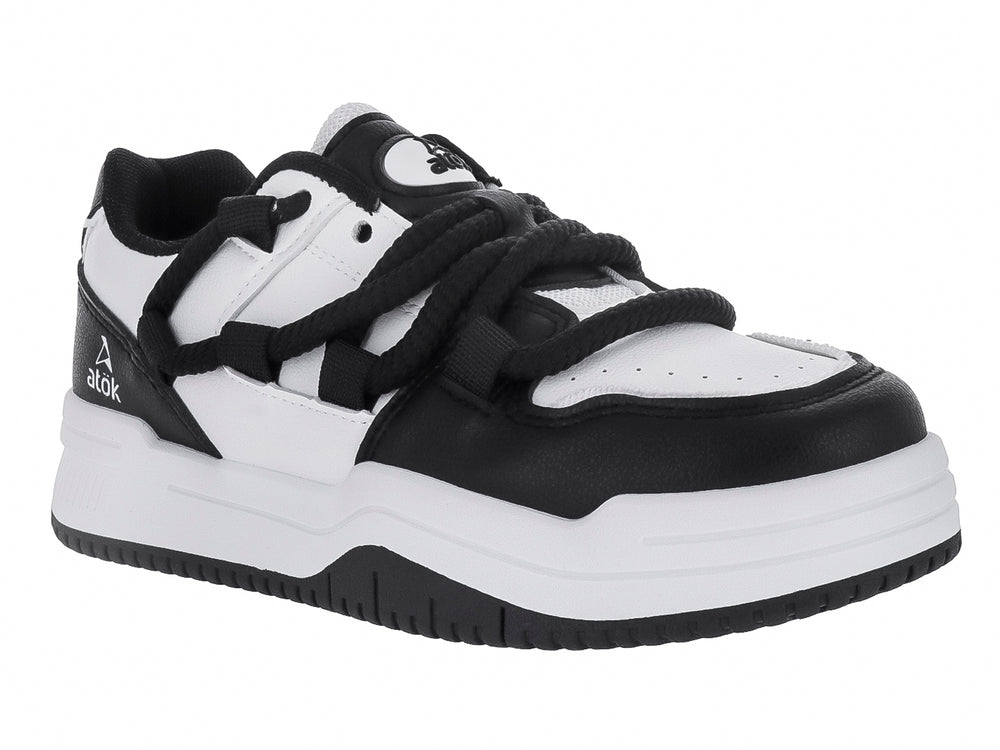 Tenis deportivos ATOK en colores blanco y negro con suela de plataforma y cordones anchos.