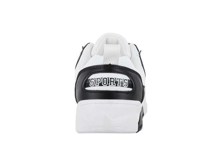 Tenis blancos y negros con diseño de estrella lateral y suela gruesa.