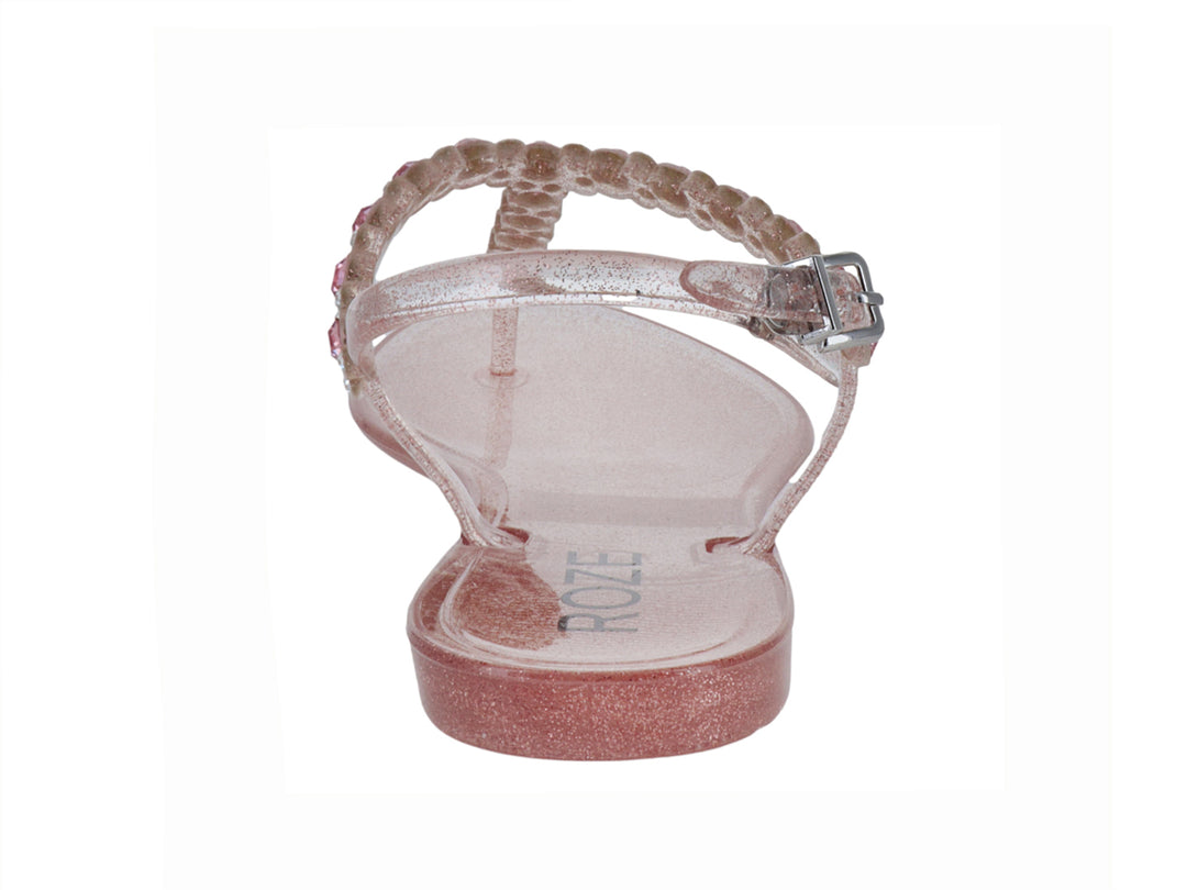 Sandalia plana color rosa con glitter y detalles de cuentas brillantes para niña.