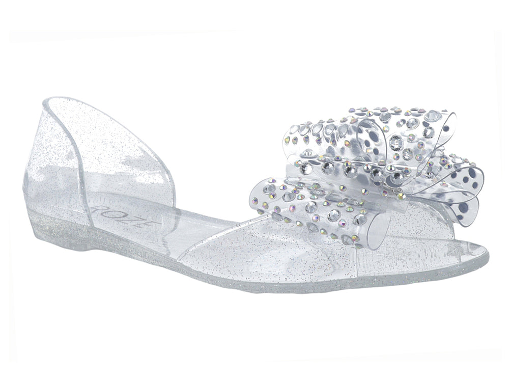 Zapato plano transparente con glitter y adorno de pedrería brillante en la punta para niña.