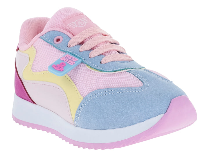 Tenis deportivos infantiles multicolores en tonos rosa, azul, amarillo y morado con suela blanca.