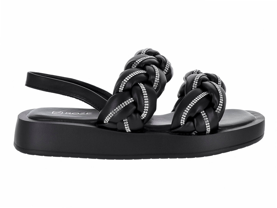 Sandalias negras de plataforma con tiras trenzadas decoradas con brillantes y correa posterior.