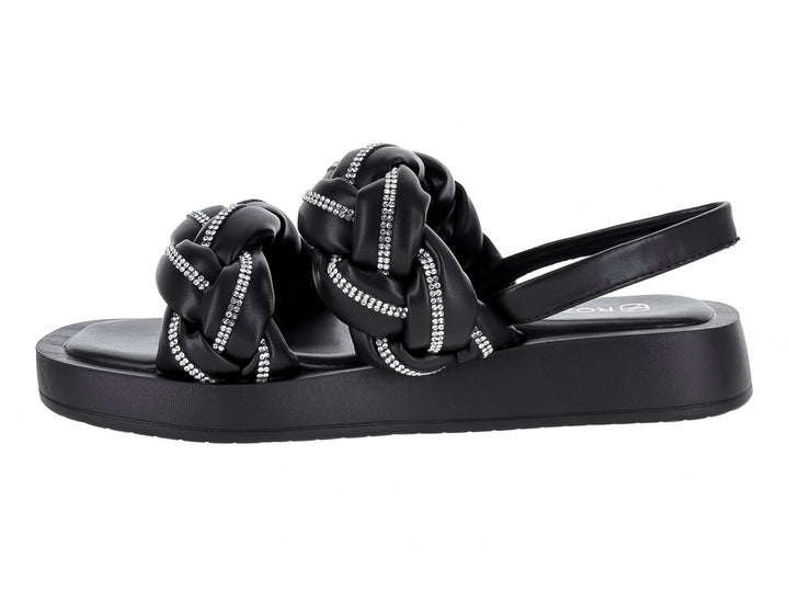 Sandalias negras de plataforma con tiras trenzadas decoradas con brillantes y correa posterior.
