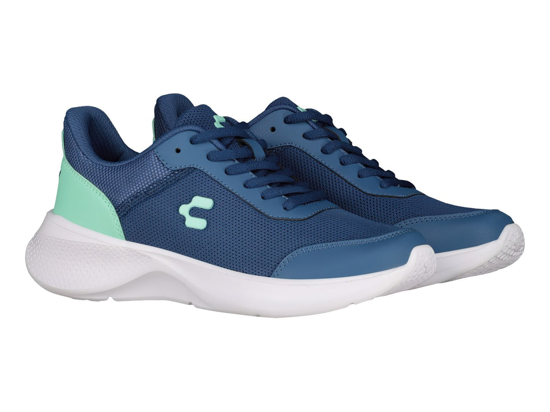 Tenis deportivos Charly color azul marino con detalle aqua en el talón y suela blanca.