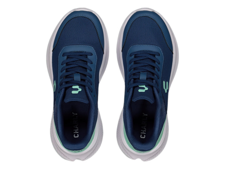 Tenis deportivos Charly color azul marino con detalle aqua en el talón y suela blanca.