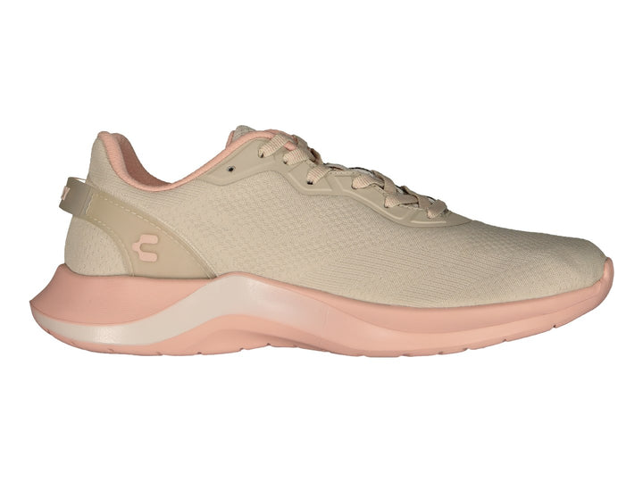 Tenis deportivos Charly color beige con suela rosa, vista lateral.