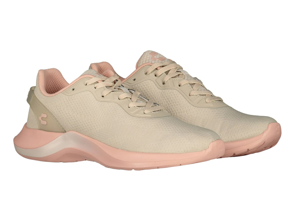 Tenis deportivos Charly color beige con suela rosa, vista lateral.
