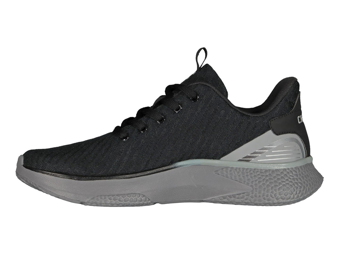 Tenis deportivos Charly en color negro con suela y detalles en gris.