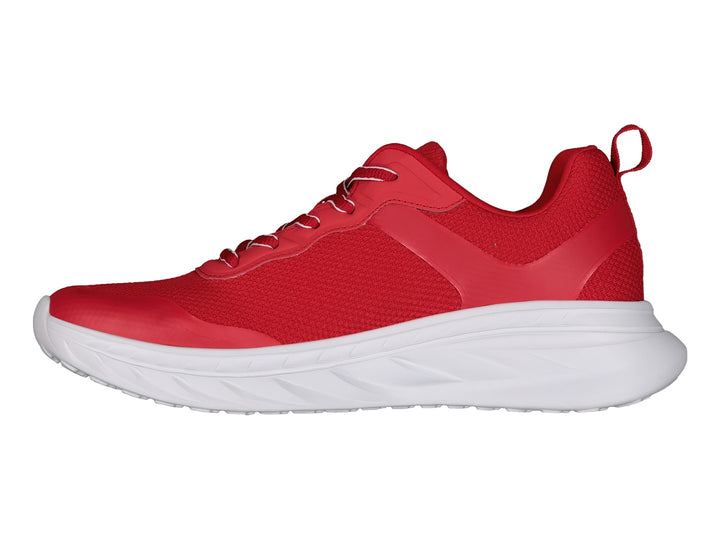Tenis deportivos Charly de color rojo con suela blanca.
