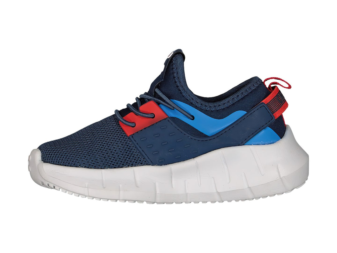 Tenis deportivos Charly color azul marino con suela blanca y detalles en rojo y azul claro.