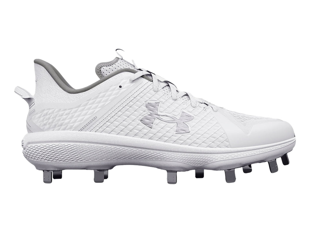 Zapato deportivo Under Armour blanco de corte bajo con tacos grises en la suela.