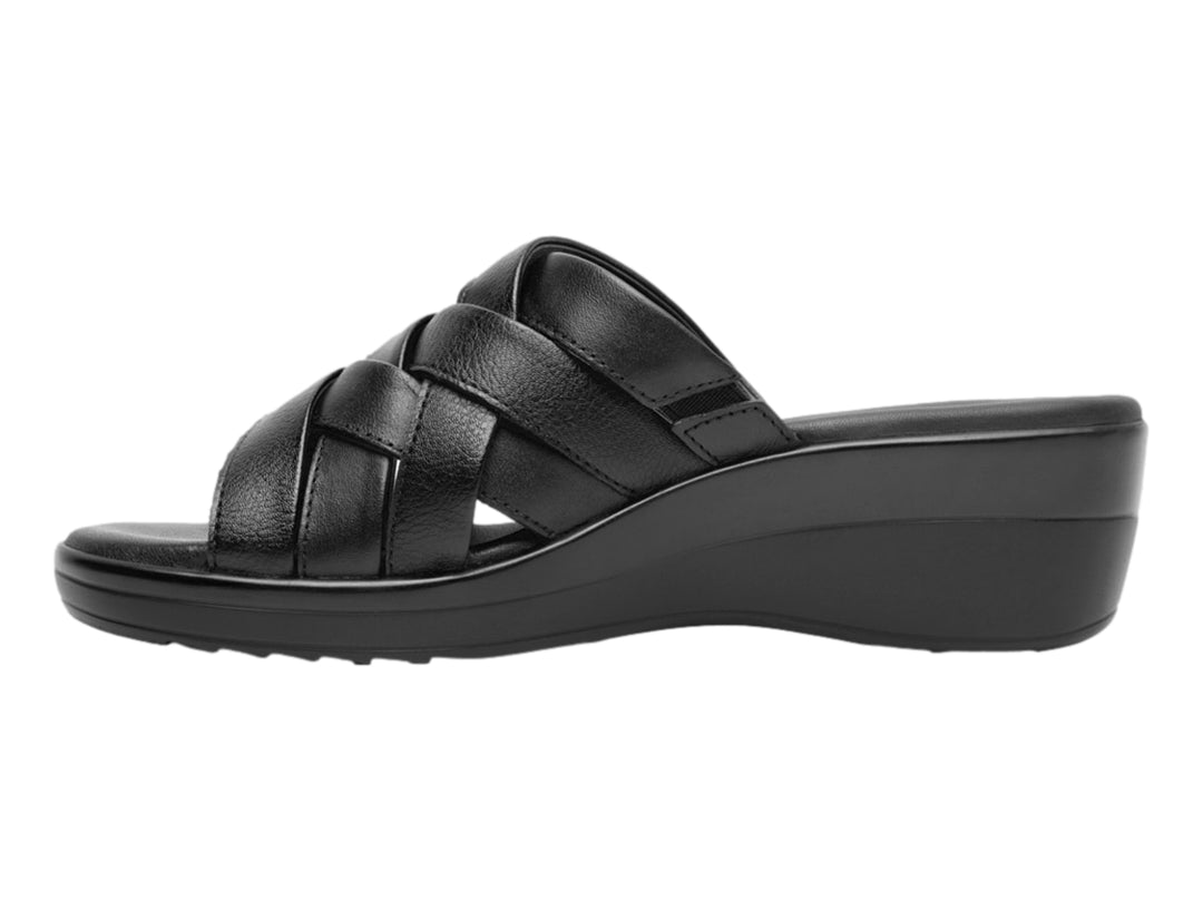 Sandalia Flexi color negro para mujer con diseño de tiras entrelazadas y suela de cuña cómoda.