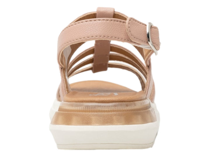 Sandalia Flexi color rosa con suela blanca y correas ajustables.