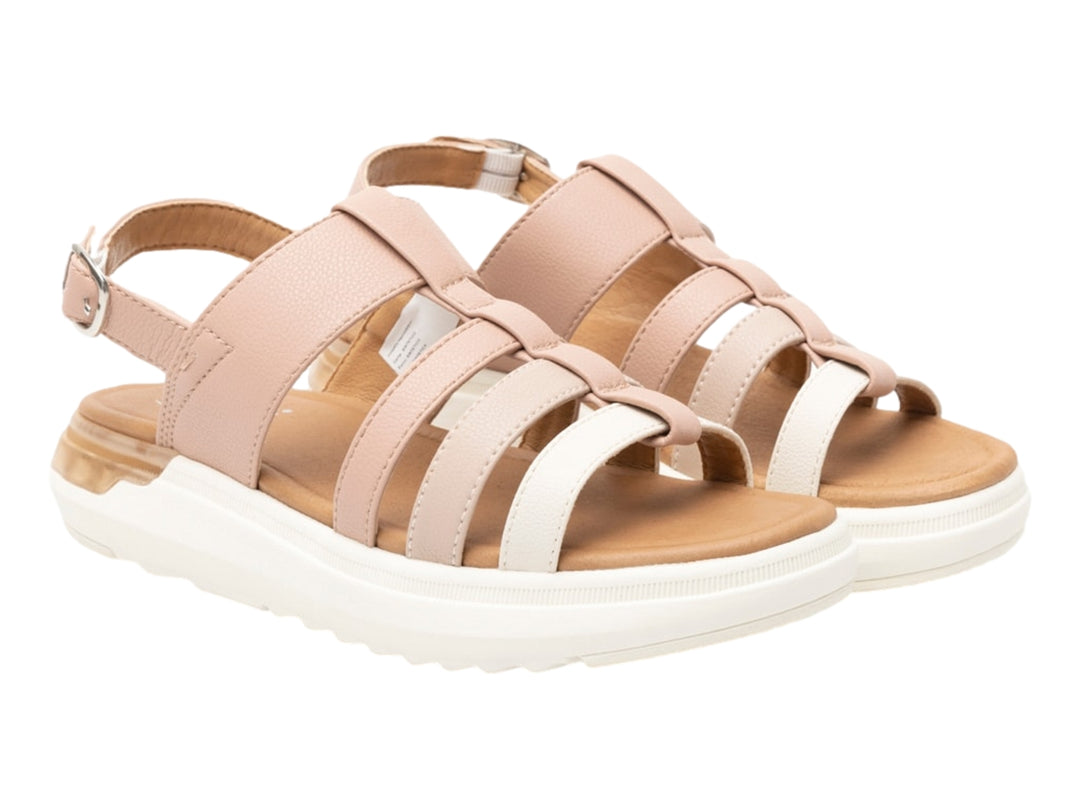 Sandalia Flexi color rosa con suela blanca y correas ajustables.