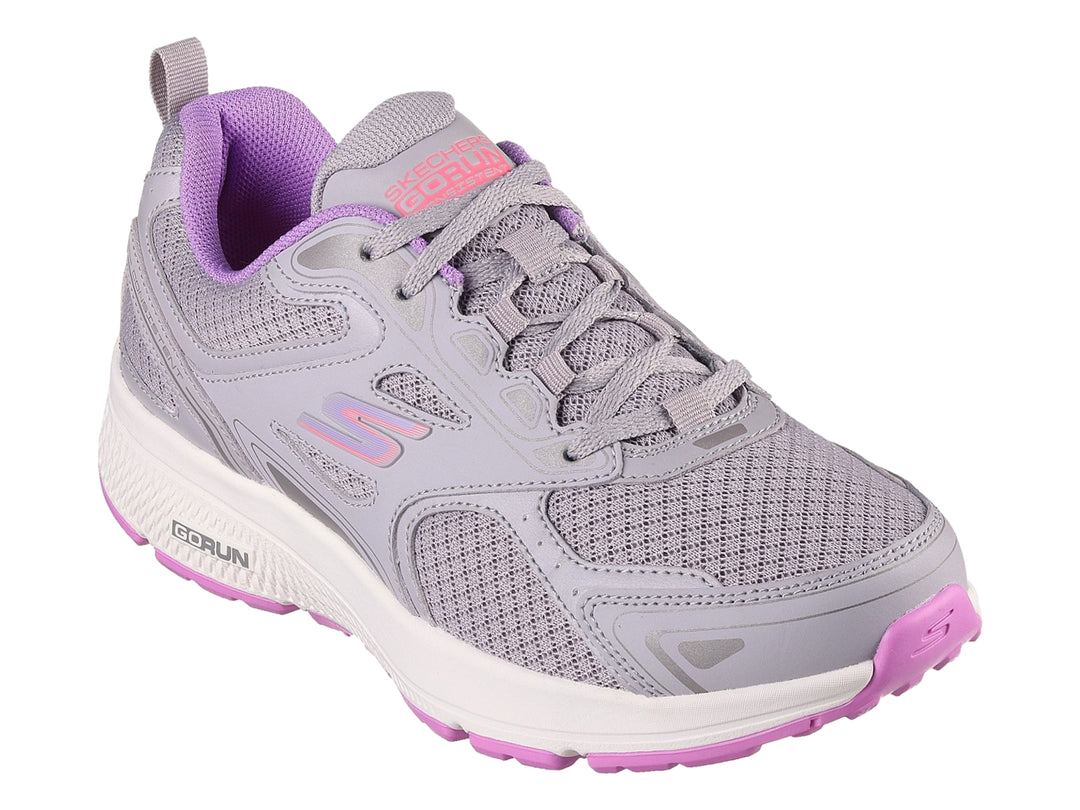 Tenis deportivos Skechers color gris con detalles en lavanda y suela blanca.