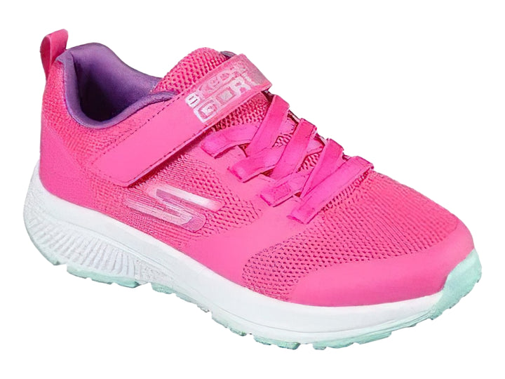 Tenis deportivos SKECHERS para niña en color rosa con suela blanca y correa de velcro.