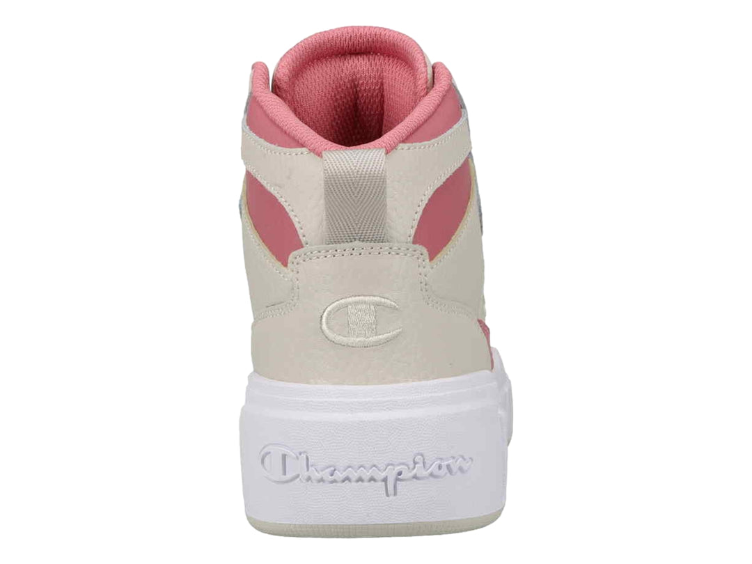 Tenis Champion de bota color beige con detalles en rosa y suela blanca ancha.