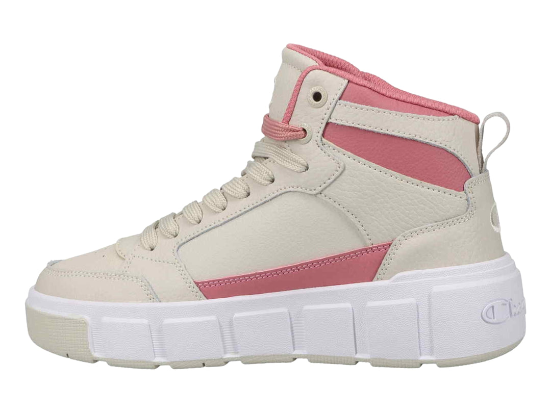 Tenis Champion de bota color beige con detalles en rosa y suela blanca ancha.