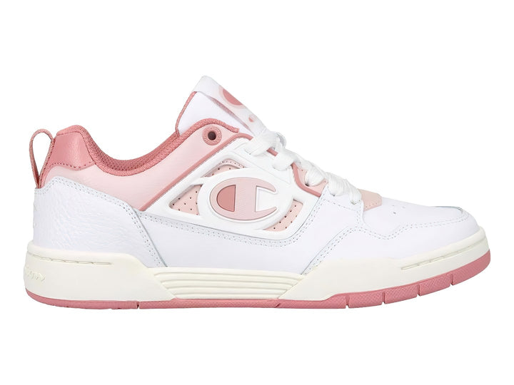 Tenis deportivos Champion de corte bajo en color blanco con detalles en rosa y suela blanca y rosa.
