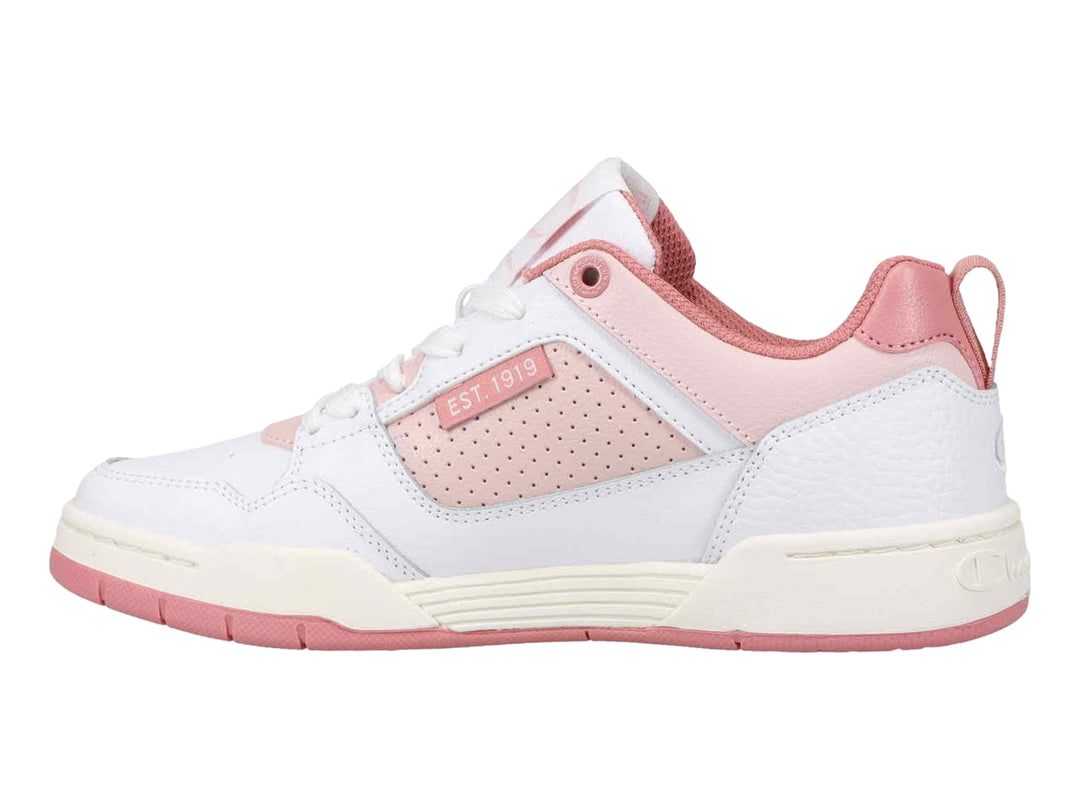 Tenis deportivos Champion de corte bajo en color blanco con detalles en rosa y suela blanca y rosa.