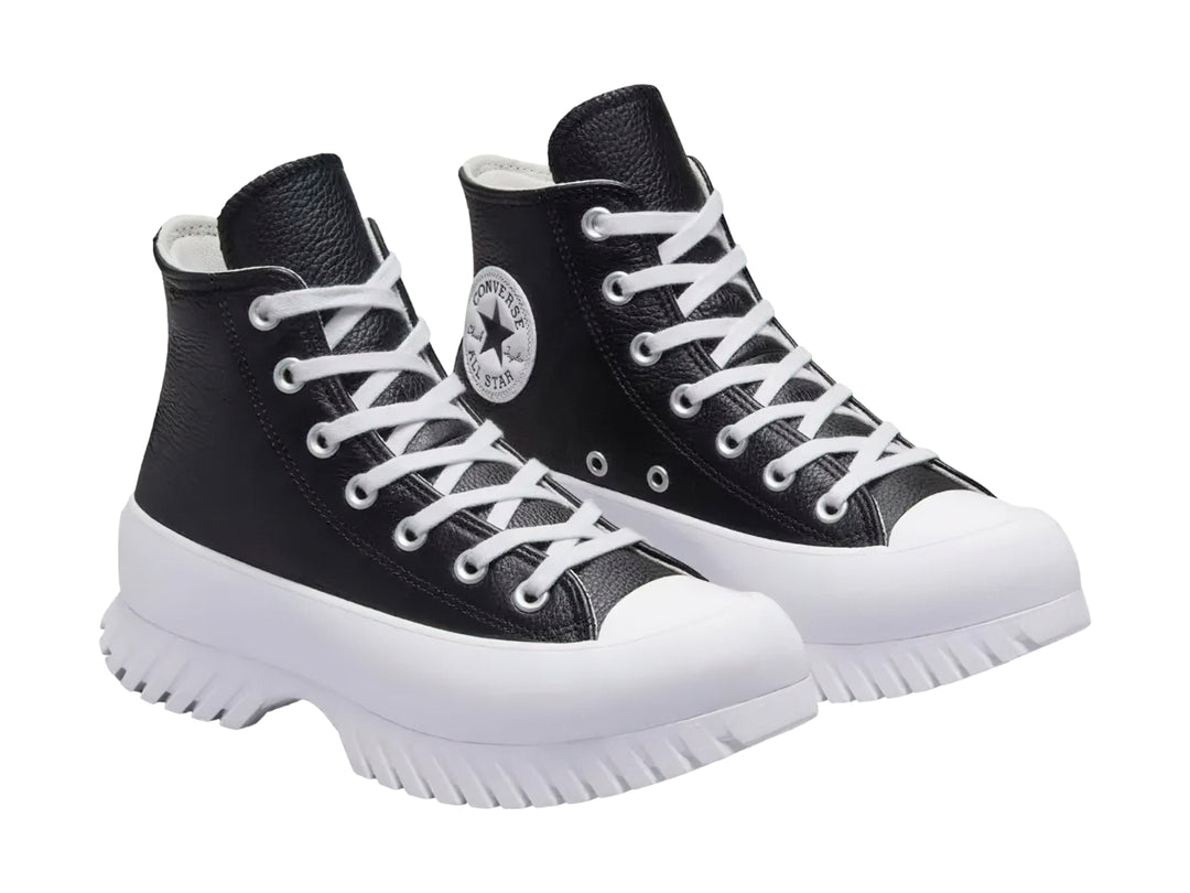 Tenis Converse Chuck Taylor All Star Lugged 2.0 Hi en color negro con suela blanca de plataforma dentada.